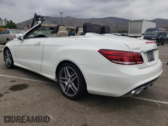 2016 Mercedes-Benz E 400 with VIN WDDKK6FF4GF350570, listed as a Copart auction lot 76563934 with 76,057 mi miles and Salvage Title. Bid and sale history available at carsss.com. Image 2.