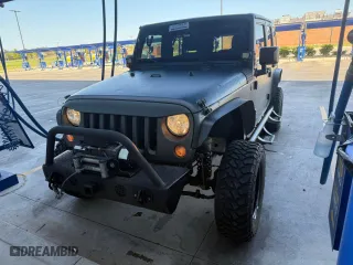 2015 Jeep Wrangler Unlimited Rubicon with VIN 1C4BJWFG3FL547025, listed as a Copart auction lot 53170835 with 103,707 mi miles and Clean Title. Bid and sale history available at carsss.com. Image 2.