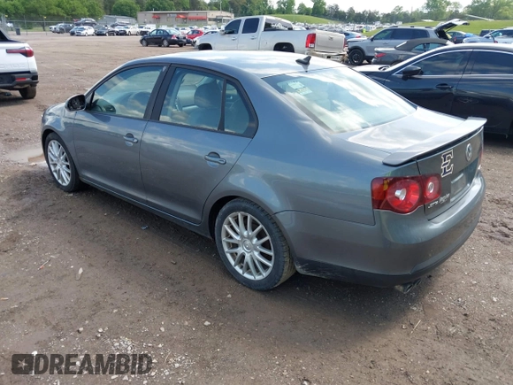 2008 Volkswagen Jetta Sedan Wolfsburg with VIN 3VWRJ71K58M185147, listed as a IAAI auction lot 42076387 with 193,621 mi miles. Bid and sale history available at carsss.com. Image 3.