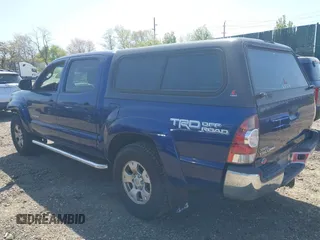 2014 Toyota Tacoma with VIN 3TMLU4EN4EM154261, listed as a IAAI auction lot 42119237 with 211,929 mi miles and . Bid and sale history available at DreamBid. Image 3.