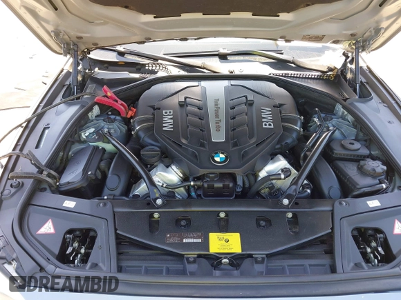 2013 BMW 5 Series 550i xDrive with VIN WBAFU9C54DDY72137, listed as a IAAI auction lot 41794124 with 58,647 mi miles and . Bid and sale history available at carsss.com. Image 10.