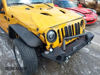 2013 Jeep Wrangler Unlimited Sport z VIN 1C4BJWDG6DL544197, wystawiony jako IAAI lot #41968556 z przebiegiem 121 101 mil mil oraz . Historia ofert i sprzedaży dostępna na DreamBid. Obrazek 6.