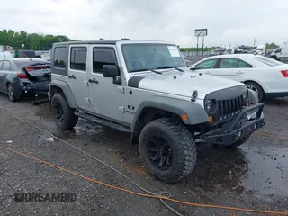 2007 Jeep Wrangler Unlimited X with VIN 1J4GA39187L209448, listed as a IAAI auction lot 42104328 with 138,302 mi miles and . Bid and sale history available at DreamBid. Image 1.