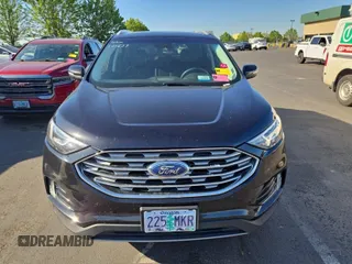 2020 Ford Edge Titanium with VIN 2FMPK3K99LBA73839, listed as a IAAI auction lot 42843885 with 92,381 mi miles and . Bid and sale history available at DreamBid. Image 24.