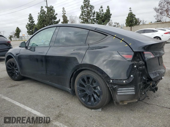 2021 Tesla Model Y Long Range z VIN 5YJYGAEE5MF143672, wystawiony jako Copart lot #55962875 z przebiegiem 74 644 mil mil oraz Szkoda całkowita • Salvage title. Historia ofert i sprzedaży dostępna na DreamBid. Obrazek 2.