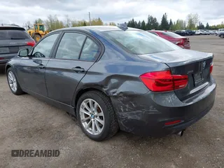 2018 BMW 3 Series 320i xDrive with VIN WBA8E5G53JNV03333, listed as a IAAI auction lot 42018275 with 45,950 mi miles. Bid and sale history available at carsss.com. Image 3.