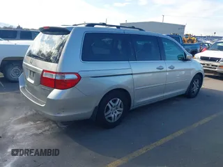 2005 Honda Odyssey EX-L with VIN 5FNRL38615B062427, listed as a IAAI auction lot 41922322 with 194,837 mi miles. Bid and sale history available at carsss.com. Image 4.