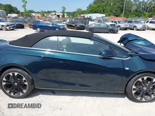 2018 Buick Cascada Sport Touring z VIN W04WJ3N5XJG085431, wystawiony jako IAAI lot #42129756 z przebiegiem 24 364 mil mil oraz . Historia ofert i sprzedaży dostępna na DreamBid. Obrazek 13.
