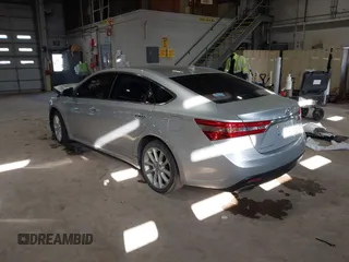 2013 Toyota Avalon XLE with VIN 4T1BK1EB0DU058025, listed as a IAAI auction lot 41845415 with 173,359 mi miles and . Bid and sale history available at DreamBid. Image 3.