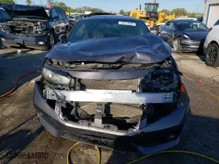 2018 Honda Civic Si Coupe with VIN 2HGFC3A59JH757894, listed as a Copart auction lot 72514584 with 65,189 mi miles and Salvage Title. Bid and sale history available at carsss.com. Image 5.
