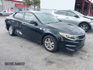 2016 Kia Optima LX with VIN 5XXGT4L31GG024240, listed as a IAAI auction lot 41727309 with 70,031 mi miles. Bid and sale history available at carsss.com. Image 1.