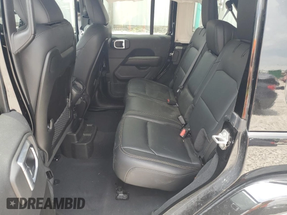 2024 Jeep Wrangler Sahara with VIN 1C4PJXEG0RW335831, listed as a Copart auction lot 61973055 with 15,785 mi miles and Salvage title. Bid and sale history available at DreamBid. Image 11.