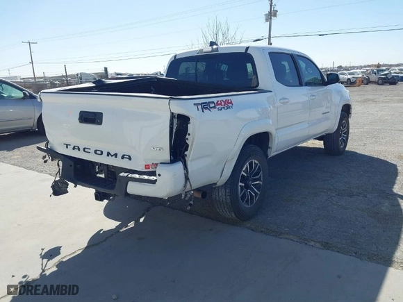 2020 Toyota Tacoma 4WD SR5 with VIN 3TMCZ5AN0LM350742, listed as a IAAI auction lot 41813786 with 84,109 mi miles. Bid and sale history available at carsss.com. Image 4.