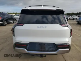 2024 Kia EV9 Land z VIN KNDADFS52R6027182, wystawiony jako Copart lot #73757814 z przebiegiem Nie podano mil oraz Nie do naprawy. Historia ofert i sprzedaży dostępna na DreamBid. Obrazek 6.