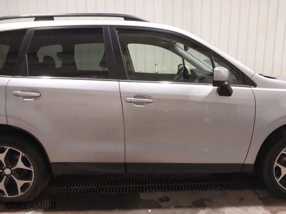 2016 Subaru Forester 2.0XT Premium with VIN JF2SJGDC4GH551225, listed as a IAAI auction lot 40831025 with 70,996 mi miles. Bid and sale history available at carsss.com. Image 14.