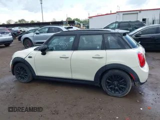 2015 MINI Hardtop 4 Door with VIN WMWXS5C52FT831291, listed as a IAAI auction lot 42179801 with 63,261 mi miles and . Bid and sale history available at DreamBid. Image 15.