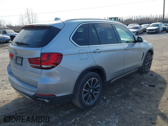 2018 BMW X5 xDrive35i with VIN 5UXKR0C51J0X92651, listed as a IAAI auction lot 41724974 with 83,496 mi miles. Bid and sale history available at carsss.com. Image 4.