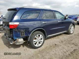 2013 Dodge Durango Crew with VIN 1C4SDHDT3DC697734, listed as a Copart auction lot 43588155 with 150,720 mi miles and Salvage title. Bid and sale history available at DreamBid. Image 3.