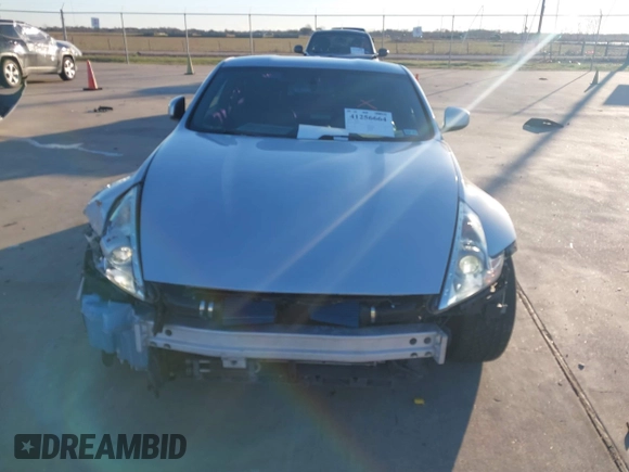 2014 Nissan 370Z Nismo with VIN JN1AZ4EH4EM634236, listed as a IAAI auction lot 41256664 with 80,294 mi miles and . Bid and sale history available at DreamBid. Image 6.