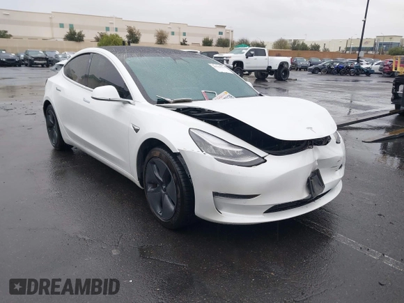 2020 Tesla Model 3 Standard Range Plus with VIN 5YJ3E1EA2LF740225, listed as a IAAI auction lot 41781554 with 46,703 mi miles. Bid and sale history available at carsss.com. Image 12.