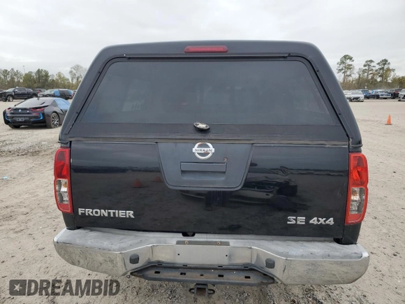 2009 Nissan Frontier SE with VIN 1N6AD06W69C400688, listed as a Copart auction lot 85140904 with 165,558 mi miles and Salvage title. Bid and sale history available at DreamBid. Image 6.
