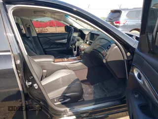 2012 Infiniti M Hybrid with VIN JN1EY1AP8CM910933, listed as a IAAI auction lot 42682477 with 157,048 mi miles and . Bid and sale history available at DreamBid. Image 5.