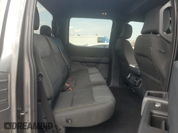 2024 Ford F-150 STX with VIN 1FTEW2K54RKE81302, listed as a Copart auction lot 72587334 with 2,555 mi miles and Salvage Title. Bid and sale history available at carsss.com. Image 10.