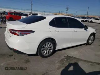 2020 Toyota Camry LE with VIN 4T1C11AK5LU944417, listed as a Copart auction lot 47455145 with 52,562 mi miles and Salvage Title. Bid and sale history available at DreamBid. Image 3.
