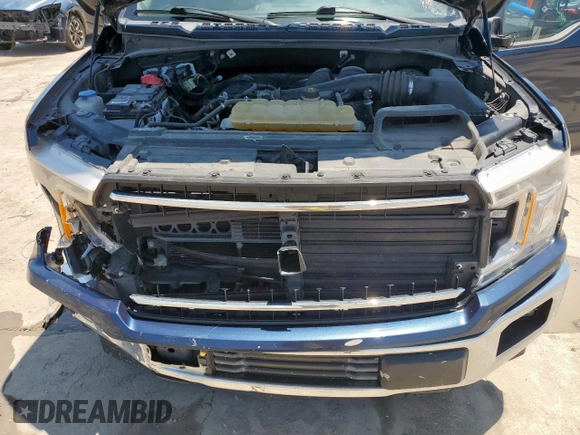 2019 Ford F-150 XL with VIN 1FTEW1CB4KKE21508, listed as a Copart auction lot 59112255 with 131,370 mi miles and Salvage title. Bid and sale history available at DreamBid. Image 11.