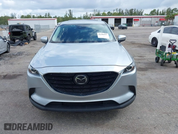 2023 Mazda CX-9 Touring Plus with VIN JM3TCBAY7P0652913, listed as a IAAI auction lot 42186917 with 20,649 mi miles and . Bid and sale history available at DreamBid. Image 12.