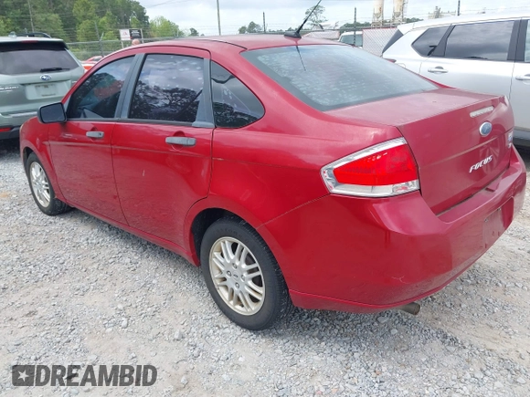2011 Ford Focus SE with VIN 1FAHP3FN7BW189853, listed as a IAAI auction lot 42121843 with 98,921 mi miles. Bid and sale history available at carsss.com. Image 3.