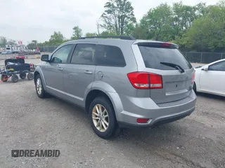 2016 Dodge Journey SXT z VIN 3C4PDDBG4GT173148, wystawiony jako IAAI lot #42269438 z przebiegiem 211 014 mil mil oraz . Historia ofert i sprzedaży dostępna na DreamBid. Obrazek 3.