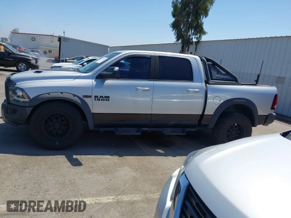 2016 Ram 1500 Rebel z VIN 1C6RR7YT5GS251994, wystawiony jako IAAI lot #42139378 z przebiegiem 102 736 mil mil oraz . Historia ofert i sprzedaży dostępna na DreamBid. Obrazek 14.