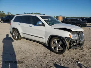 2013 Jeep Grand Cherokee Overland with VIN 1C4RJFCG8DC606862, listed as a Copart auction lot 82149804 with 155,999 mi miles and Salvage Title. Bid and sale history available at carsss.com. Image 4.