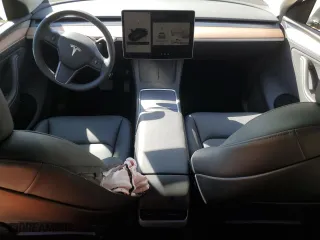 2025 Tesla Model Y Long Range with VIN 7SAYGDEE7SA345301, listed as a Copart auction lot 46693835 with 1,733 mi miles and Salvage Title. Bid and sale history available at carsss.com. Image 8.