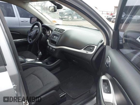 2019 Dodge Journey SE with VIN 3C4PDCBG9KT869149, listed as a IAAI auction lot 41472289 with 97,333 mi miles and . Bid and sale history available at DreamBid. Image 5.