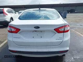2016 Ford Fusion SE Hybrid with VIN 3FA6P0LU7GR397310, listed as a IAAI auction lot 42075891 with 124,879 mi miles. Bid and sale history available at carsss.com. Image 16.