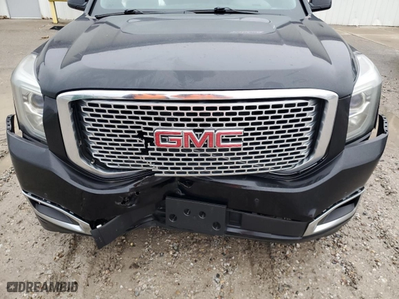 2016 GMC Yukon SLT with VIN 1GKS2BKC5GR273449, listed as a Copart auction lot 58732992 with 111,248 mi miles and Salvage Title. Bid and sale history available at carsss.com. Image 7.