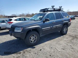 2004 Jeep Grand Cherokee Laredo z VIN 1J4GW48S24C166111, wystawiony jako Copart lot #51476135 z przebiegiem 222 835 mil mil oraz Nie do naprawy • Non repairable. Historia ofert i sprzedaży dostępna na DreamBid. Obrazek 1.
