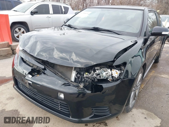2012 Scion tC z VIN JTKJF5C72C3024241, wystawiony jako IAAI lot #41750123 z przebiegiem 136 695 mil mil oraz . Historia ofert i sprzedaży dostępna na DreamBid. Obrazek 6.