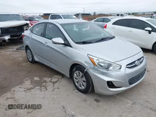 2015 Hyundai Accent GLS with VIN KMHCT4AE5FU883113, listed as a IAAI auction lot 41899701 with 123,023 mi miles and . Bid and sale history available at carsss.com. Image 1.