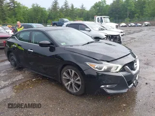 2017 Nissan Maxima Platinum z VIN 1N4AA6AP6HC400662, wystawiony jako IAAI lot #42446516 z przebiegiem 128 938 mil mil oraz . Historia ofert i sprzedaży dostępna na DreamBid. Obrazek 1.
