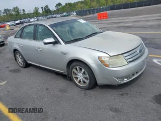 2008 Ford Taurus SEL with VIN 1FAHP24W88G178210, listed as a IAAI auction lot 41933552 with 142,971 mi miles. Bid and sale history available at carsss.com. Image 1.