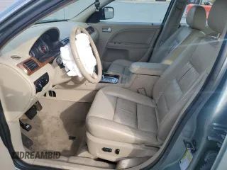 2006 Ford Five Hundred SEL с VIN 1FAFP24116G131870, выставлен на аукционе Copart как лот 53336385 с пробегом Не указан миль и Списание • Salvage title. История ставок и продаж доступна на DreamBid. Изображение 7.