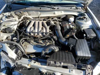 2002 Mitsubishi Galant ES z VIN 4A3AA46H42E060744, wystawiony jako Copart lot #37732694 z przebiegiem 173 507 mil mil oraz Szkody całkowita. Historia ofert i sprzedaży dostępna na DreamBid. Obrazek 11.