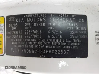 2006 Kia Sedona LX with VIN KNDMB233466022537, listed as a Copart auction lot 71130354 with 215,997 mi miles and Salvage Title. Bid and sale history available at carsss.com. Image 13.