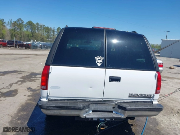 1997 Chevrolet Tahoe with VIN 1GNEK13R8VJ338626, listed as a IAAI auction lot 41976126 with 163,263 mi miles. Bid and sale history available at carsss.com. Image 16.