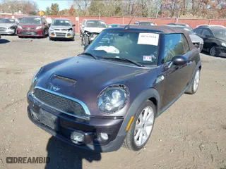 2013 MINI Cooper Convertible S with VIN WMWZP3C56DT705074, listed as a IAAI auction lot 40762024 with 57,685 mi miles. Bid and sale history available at carsss.com. Image 18.