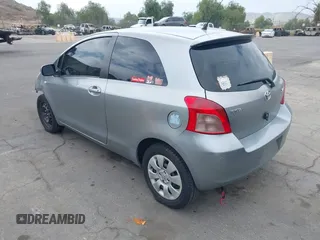 2007 Toyota Yaris with VIN JTDJT923675117537, listed as a IAAI auction lot 42116893 with 210,036 mi miles. Bid and sale history available at carsss.com. Image 3.