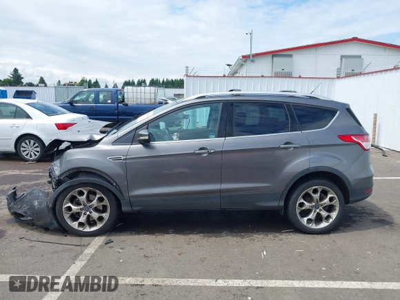 2013 Ford Escape Titanium with VIN 1FMCU9J95DUC95061, listed as a IAAI auction lot 42293047 with 124,641 mi miles and . Bid and sale history available at DreamBid. Image 15.
